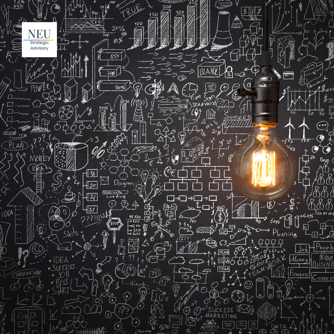 An image for a marketing agency's "lightbulb" marketing strategy, showing a clear lightbulb on the right side of the image and a blackboard with white chalk drawings.